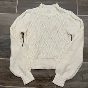 And now this cable knit mock neck long sleeve sweater size small pearl detail